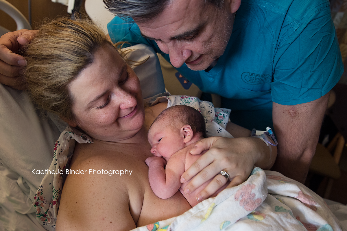 Tacoma Birth Newborn Photographer New Mother skin to skin 